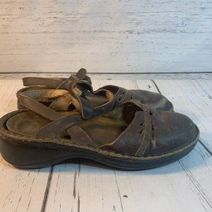 NAOT leather sandals. Covered toe. Ankle strap